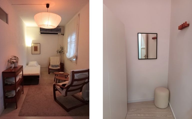 Therapy room with a couch and two armchairs, relaxing lighting and neutral-colored decoration.